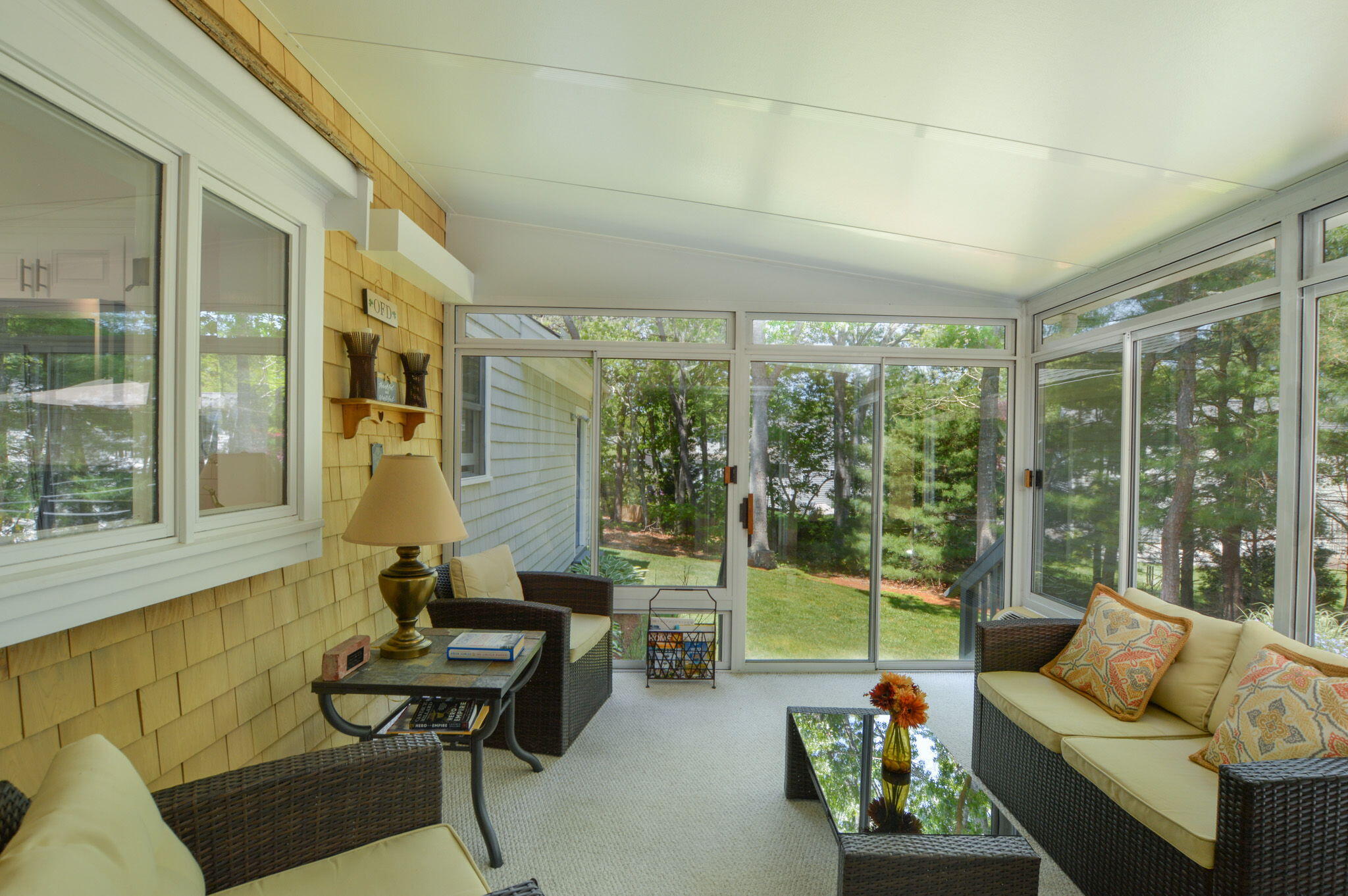 48 Hogan Drive Mashpee, MA 02649 - Photo 21 of 36 a living room with furniture and a floor to ceiling window