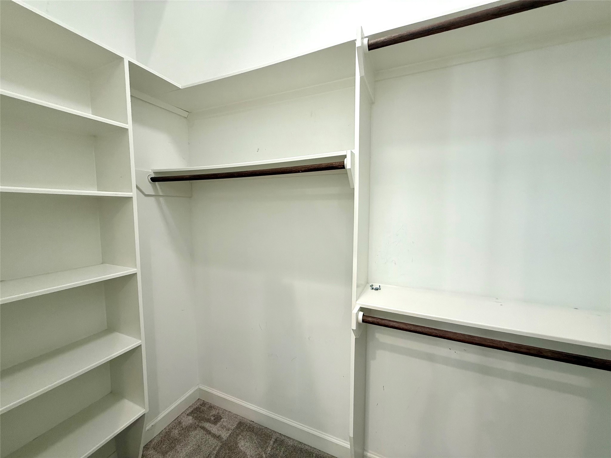 9206 Anna Street Needville, TX 77461 - Photo 12 of 24 a view of an empty walk in closet