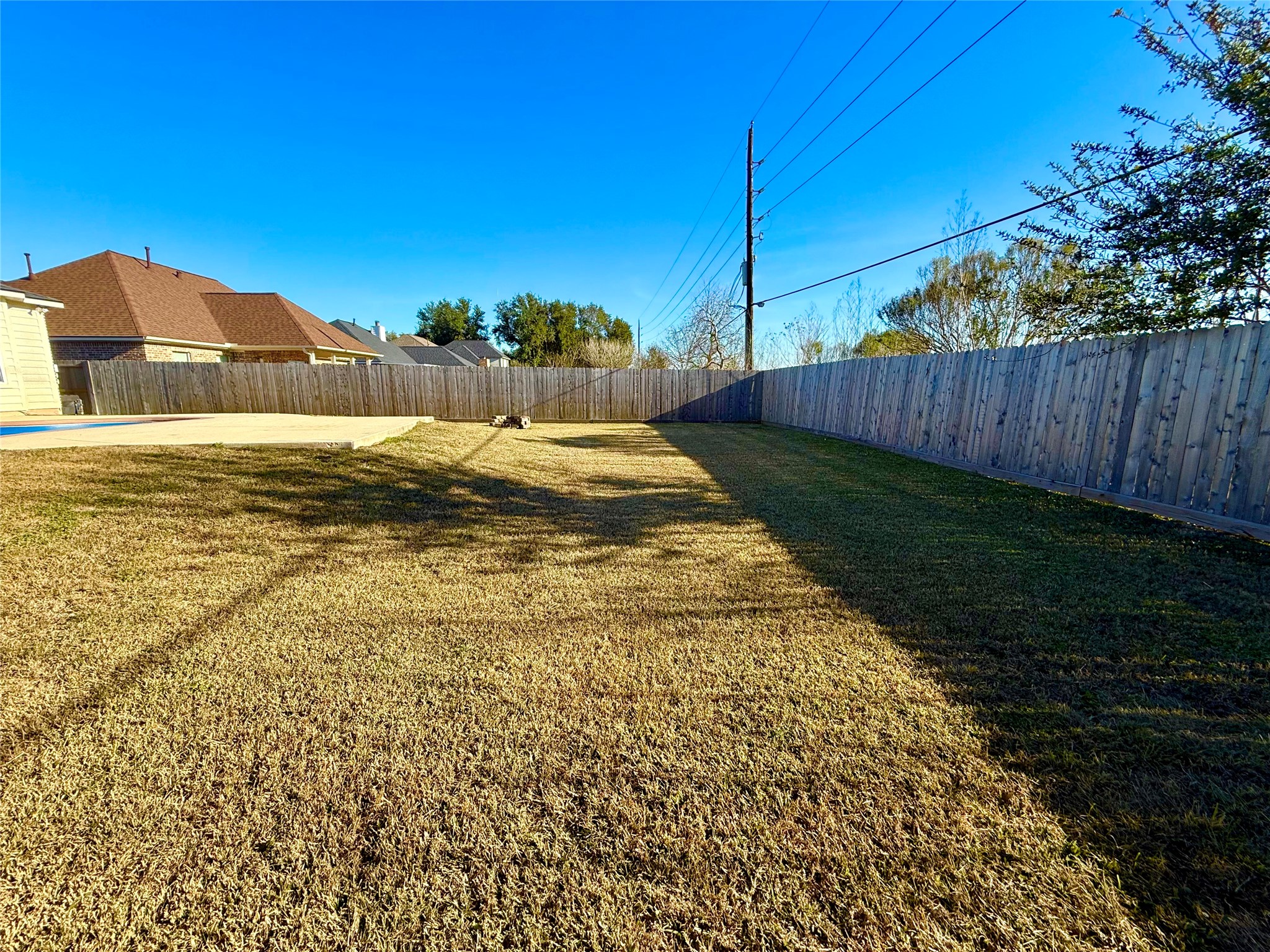 9206 Anna Street Needville, TX 77461 - Photo 24 of 24 a view of a yard