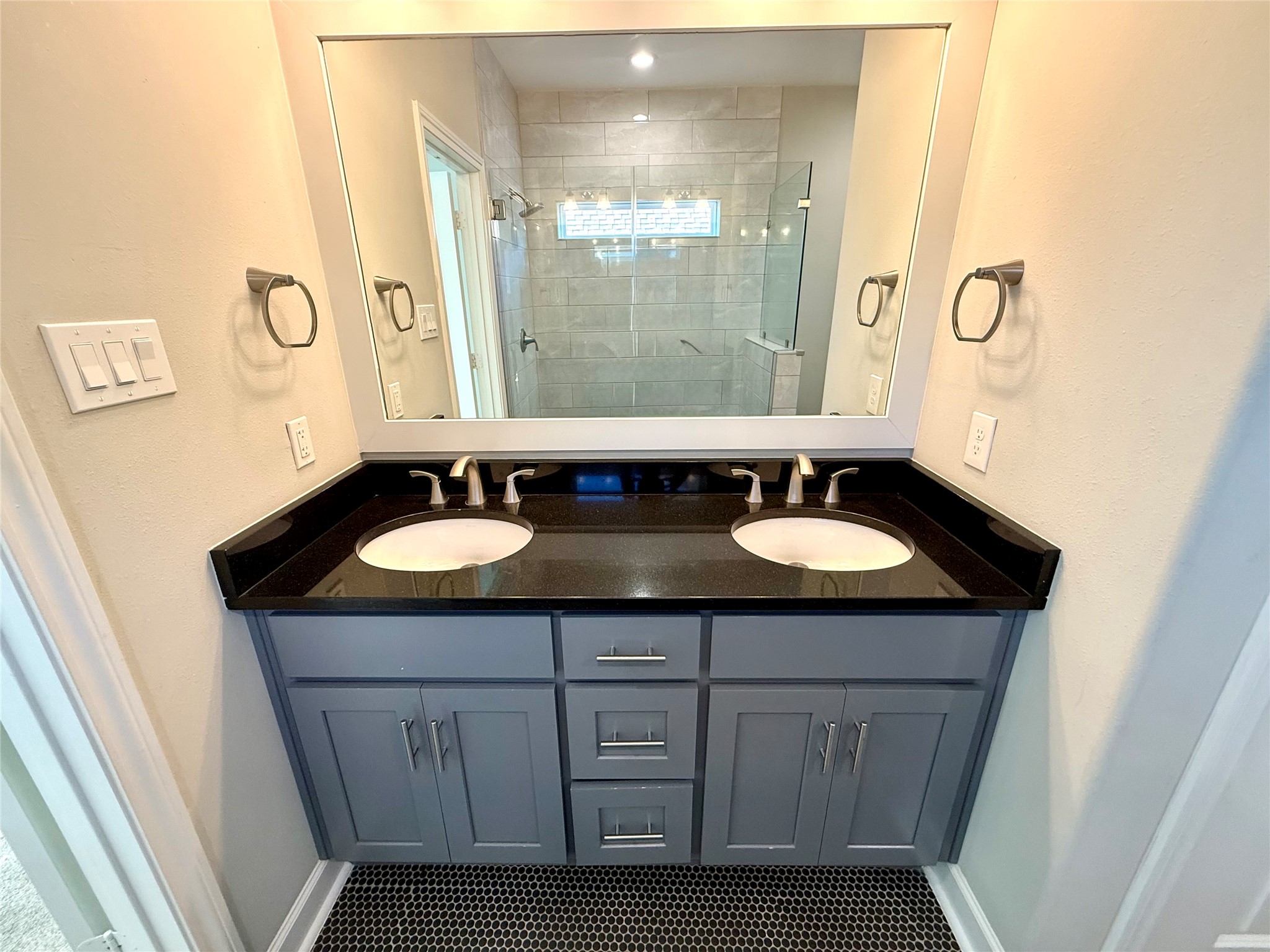 9206 Anna Street Needville, TX 77461 - Photo 9 of 24 a bathroom with a granite countertop sink and a mirror