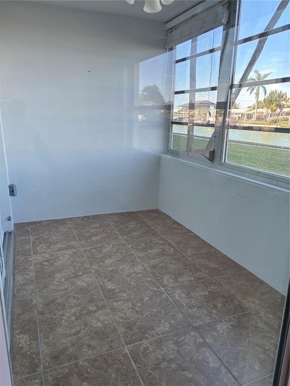 4725 Cove Circle, Unit 104 Madeira Beach, FL 33708 - Photo 13 of 22 a view of storage and utility room with washer and dryer
