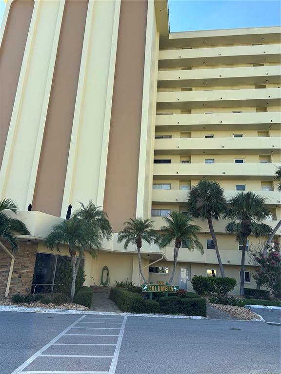 4725 Cove Circle, Unit 104 Madeira Beach, FL 33708 - Photo 17 of 22 a front view of a building