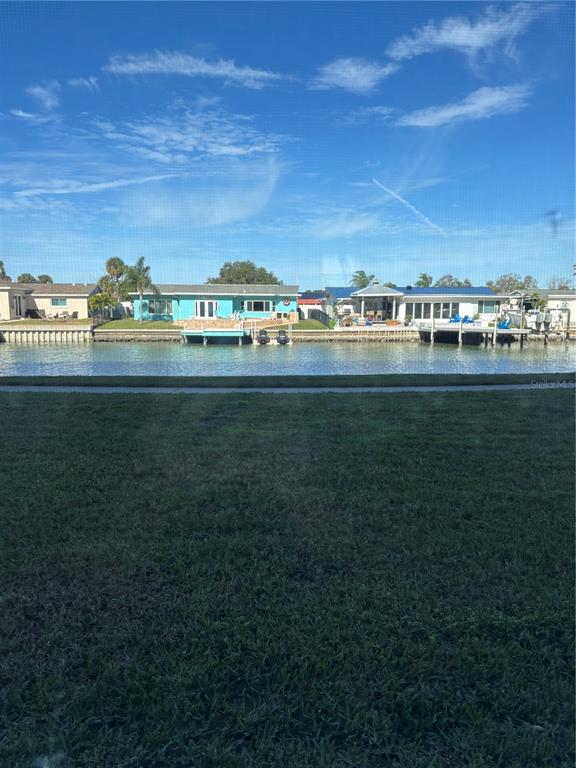 4725 Cove Circle, Unit 104 Madeira Beach, FL 33708 - Photo 22 of 22 a view of an ocean with city view