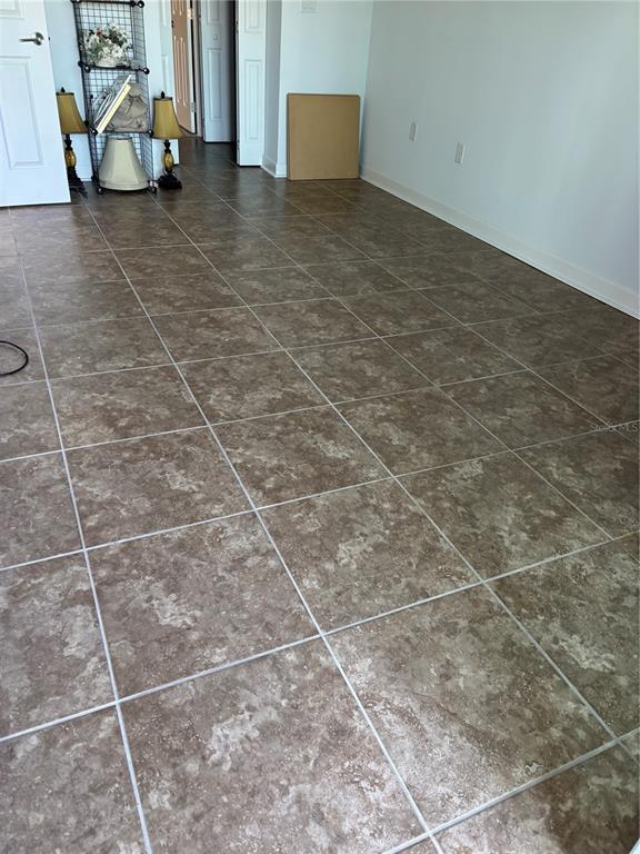 4725 Cove Circle, Unit 104 Madeira Beach, FL 33708 - Photo 7 of 22 a view of an empty room