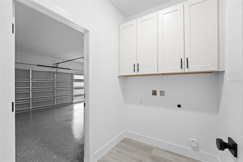 4450 Badali Road North Port, FL 34286 - Photo 15 of 28 a view of storage and utility room with cabinet