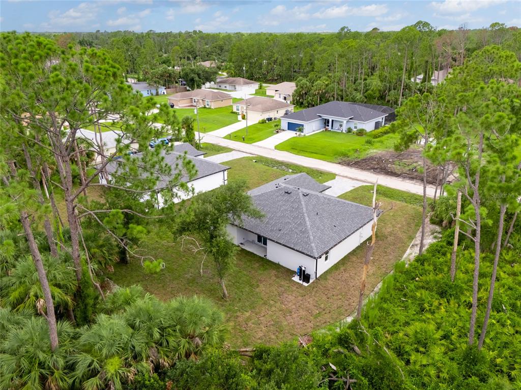 4450 Badali Road North Port, FL 34286 - Photo 18 of 28 an aerial view of a house with garden space and street view