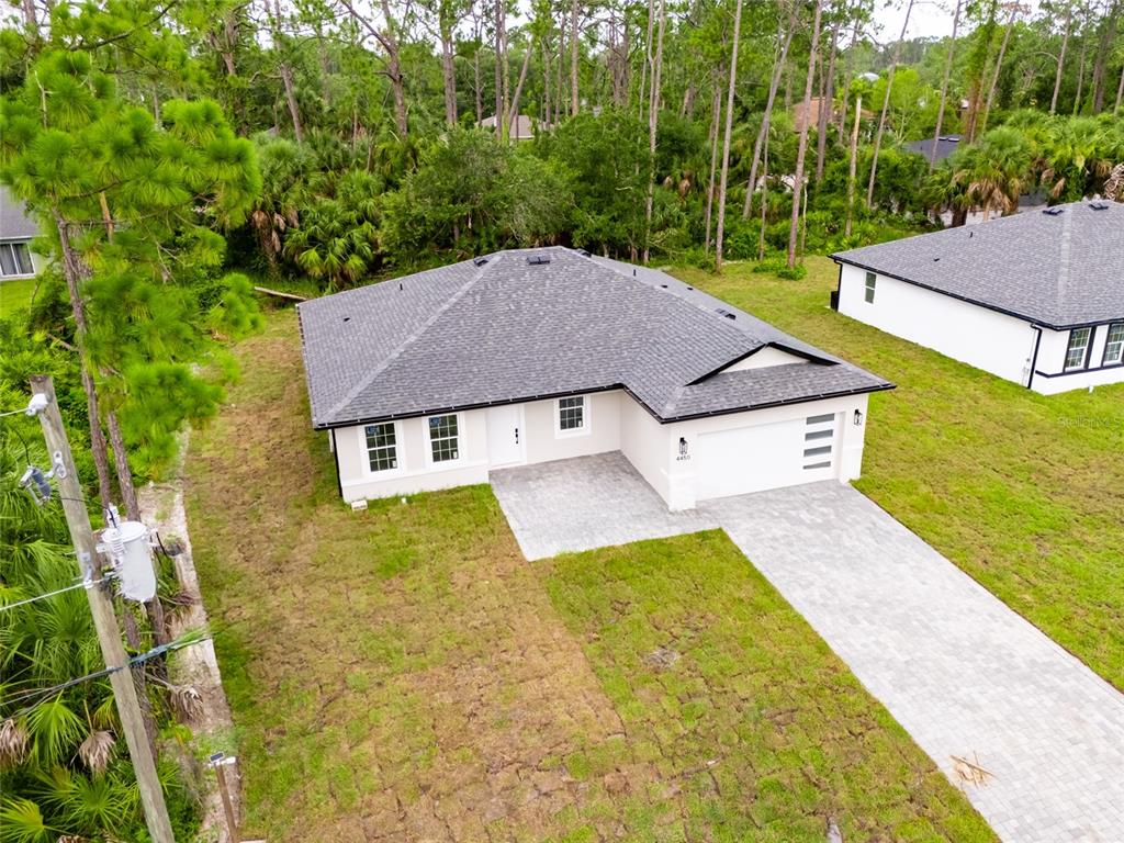 4450 Badali Road North Port, FL 34286 - Photo 23 of 28 an aerial view of a house with swimming pool