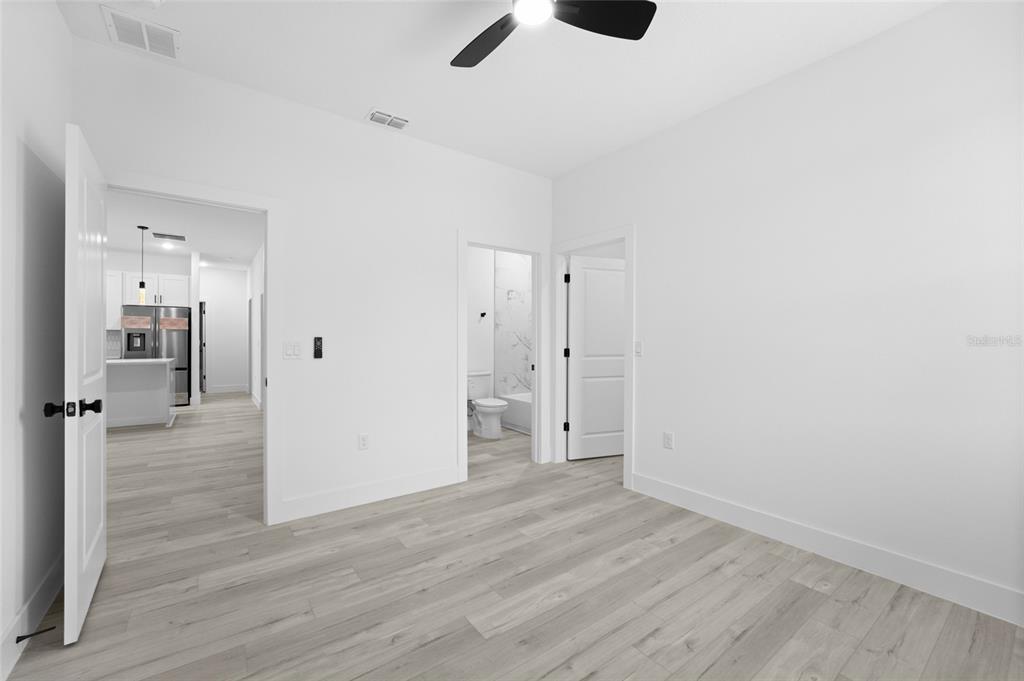 4450 Badali Road North Port, FL 34286 - Photo 10 of 28 a view of empty room with wooden floor