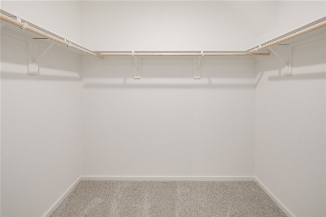 2441 Rooke Road Bryan, TX 77807 - Photo 16 of 23 a view of a room with racks on the wall