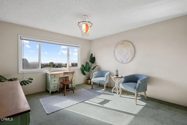 a very nice looking room with a large window