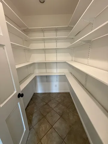 a view of a room with shelves