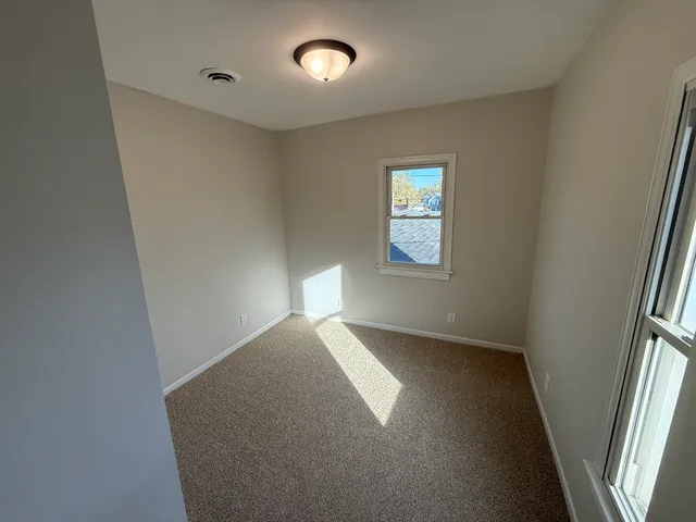 a view of swimming pool with outdoor seating