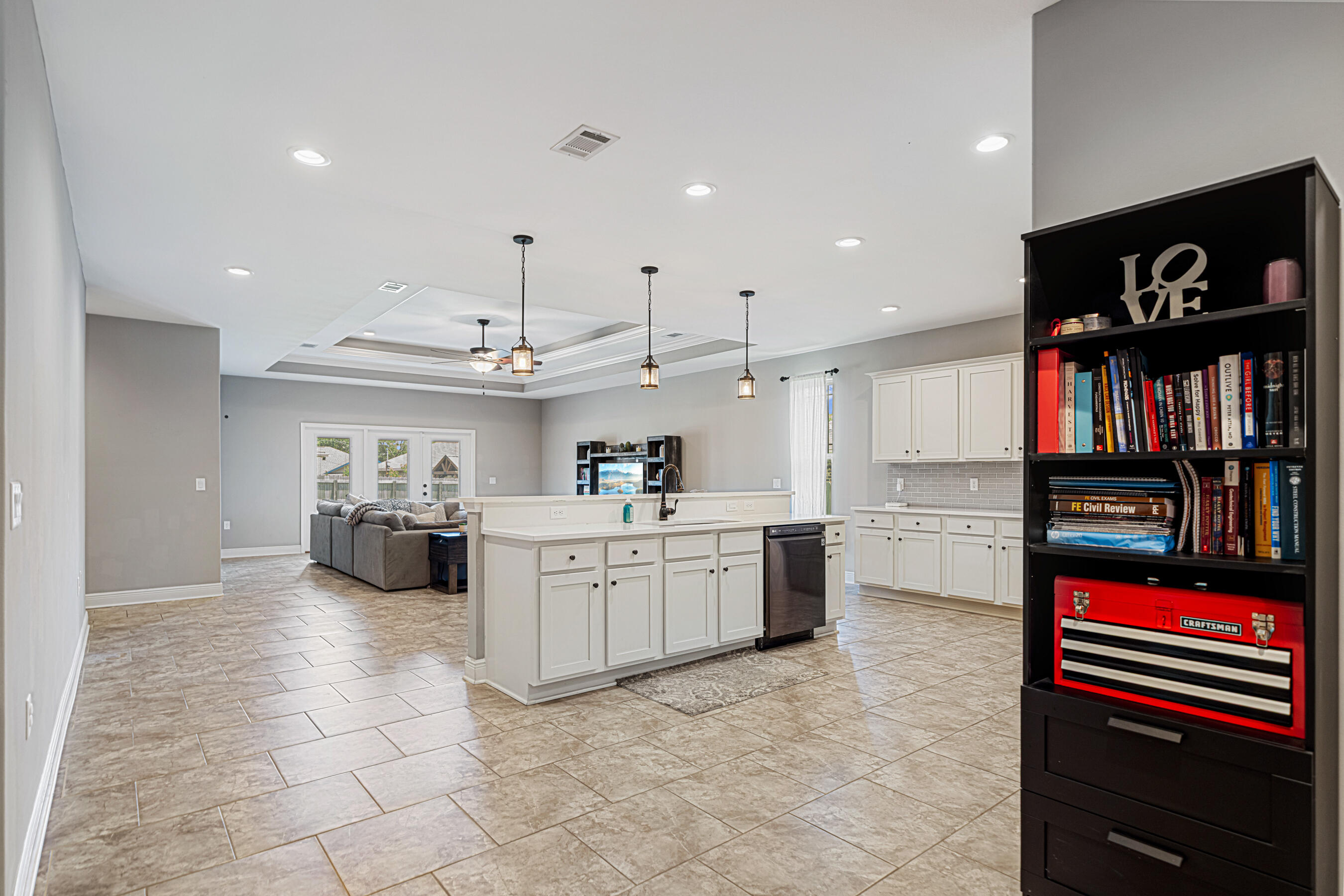 801 Playground Road Fort Walton Beach, FL 32547 - Photo 12 of 38 a kitchen with stainless steel appliances kitchen island granite countertop a sink and a stove