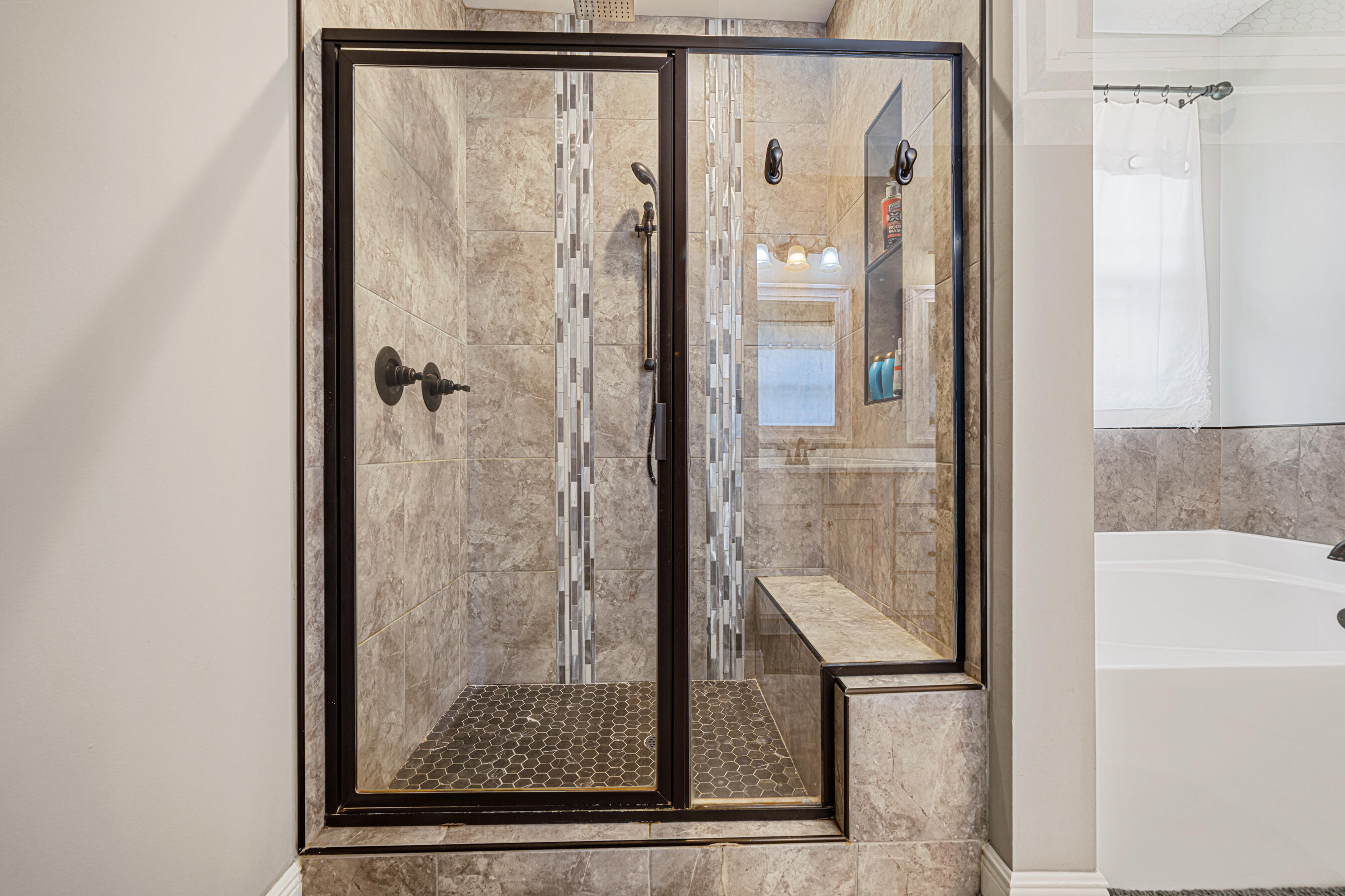 801 Playground Road Fort Walton Beach, FL 32547 - Photo 21 of 38 a bathroom with a glass shower door