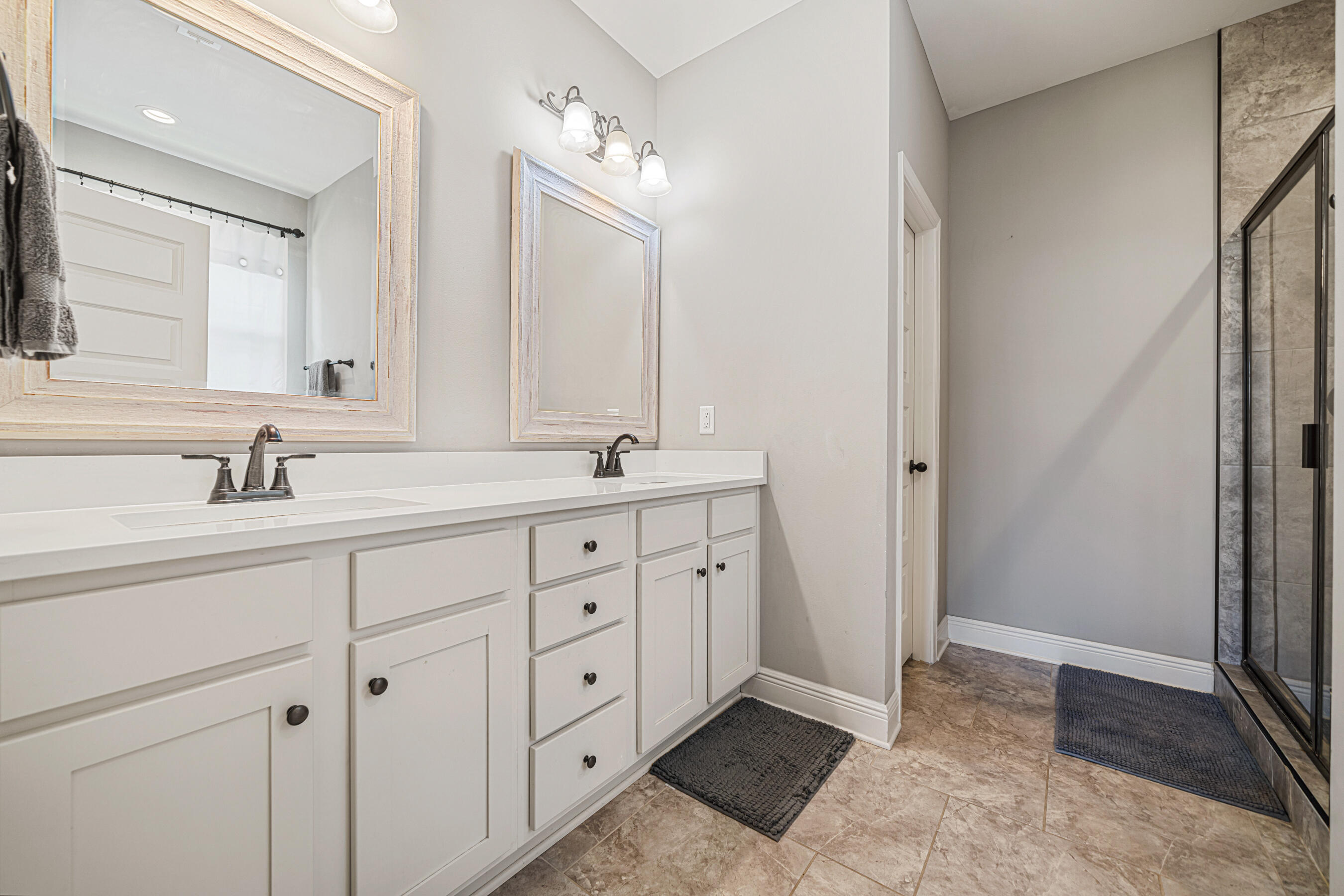 801 Playground Road Fort Walton Beach, FL 32547 - Photo 23 of 38 a bathroom with a double vanity sink mirror and