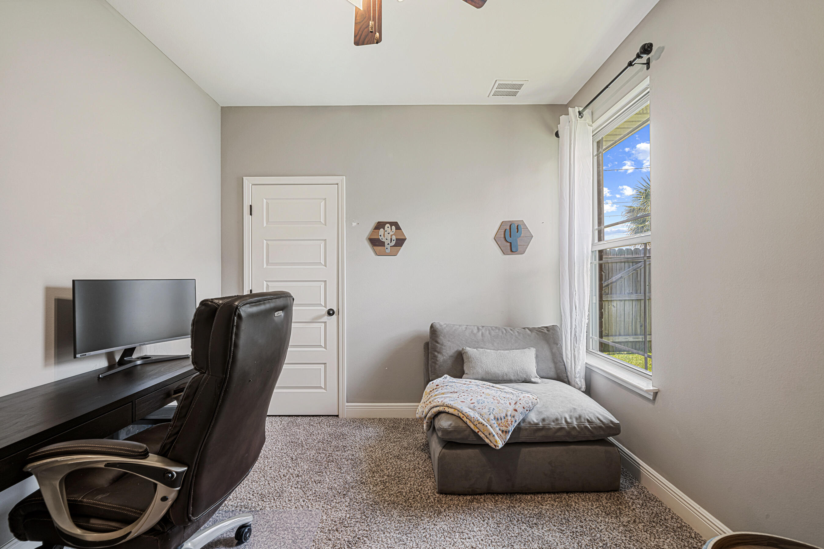 801 Playground Road Fort Walton Beach, FL 32547 - Photo 28 of 38 a bedroom with a bed and a chair