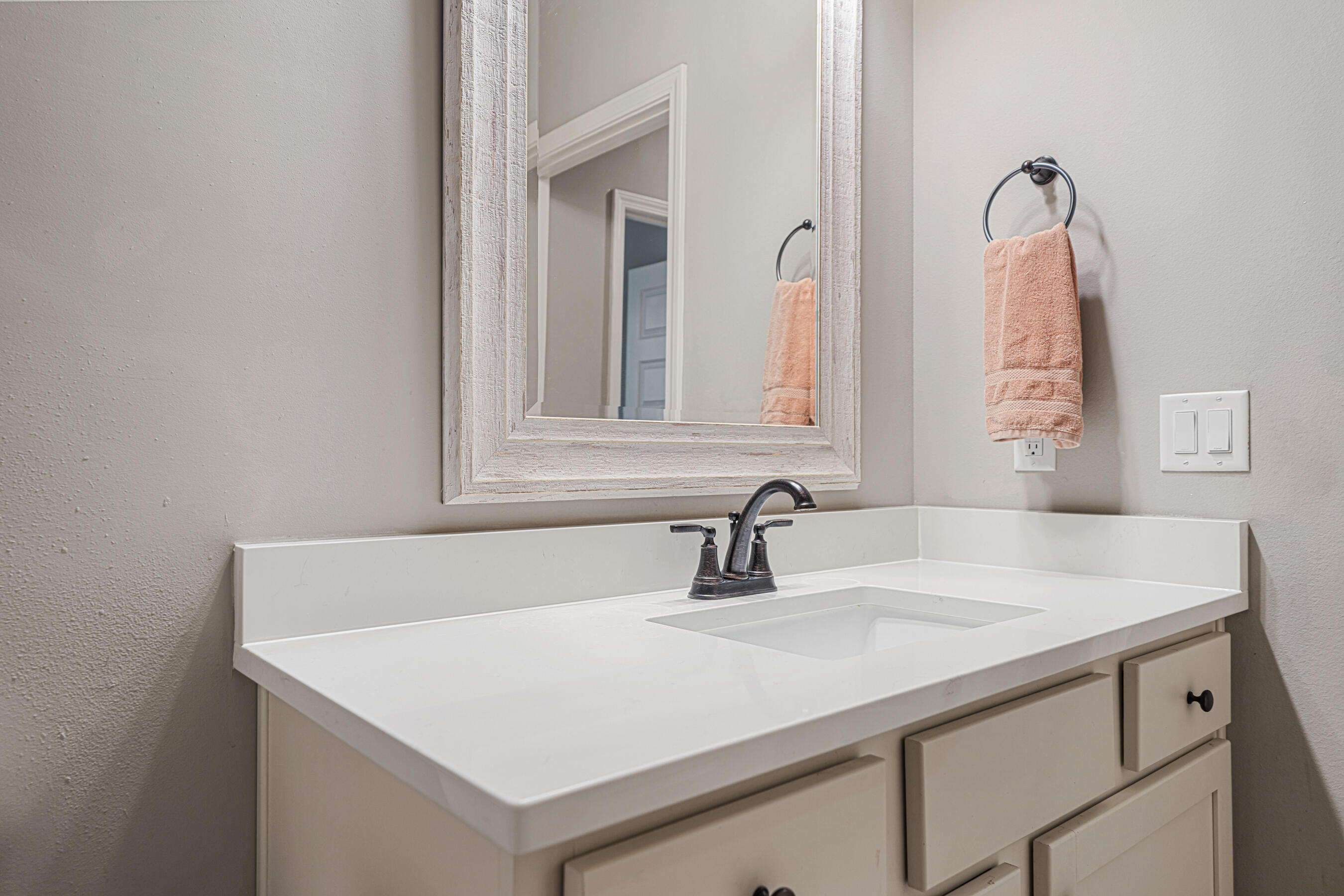 801 Playground Road Fort Walton Beach, FL 32547 - Photo 31 of 38 a bathroom with a sink and a mirror