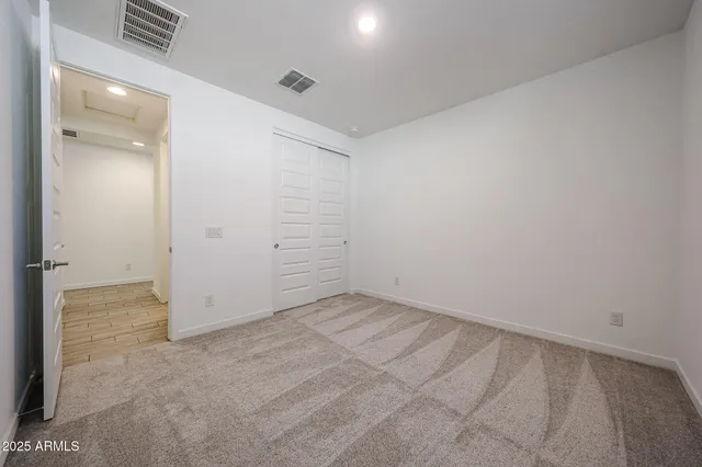 an empty room with an entryway