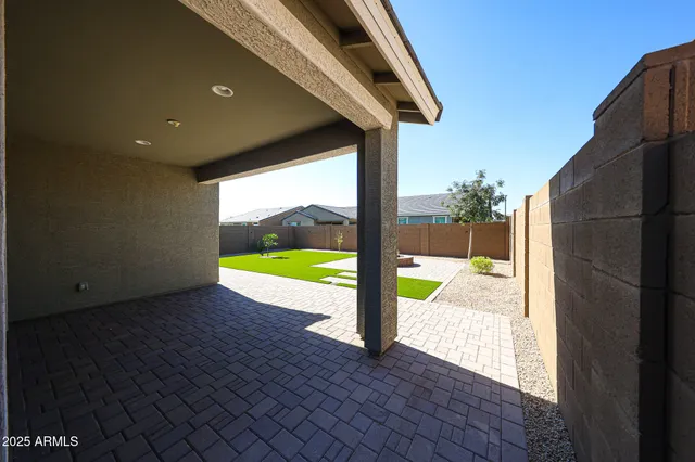 a view of swimming pool from a balcony