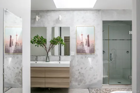 a bathroom with a bathtub and a sink