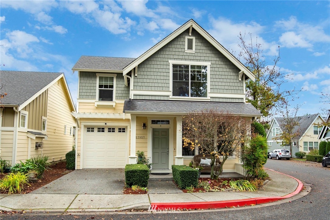 23927 33rd Drive Southeast, Unit 15 Bothell, WA 98021 - Photo 1 of 34 a front view of a house with porch