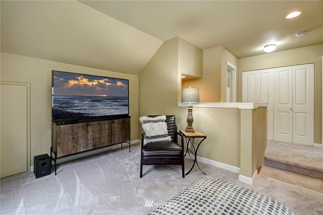 23927 33rd Drive Southeast, Unit 15 Bothell, WA 98021 - Photo 17 of 34 a living room with furniture