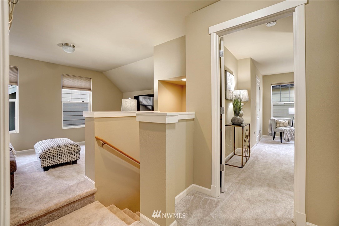 23927 33rd Drive Southeast, Unit 15 Bothell, WA 98021 - Photo 18 of 34 a en suite bathroom with a sink and mirror