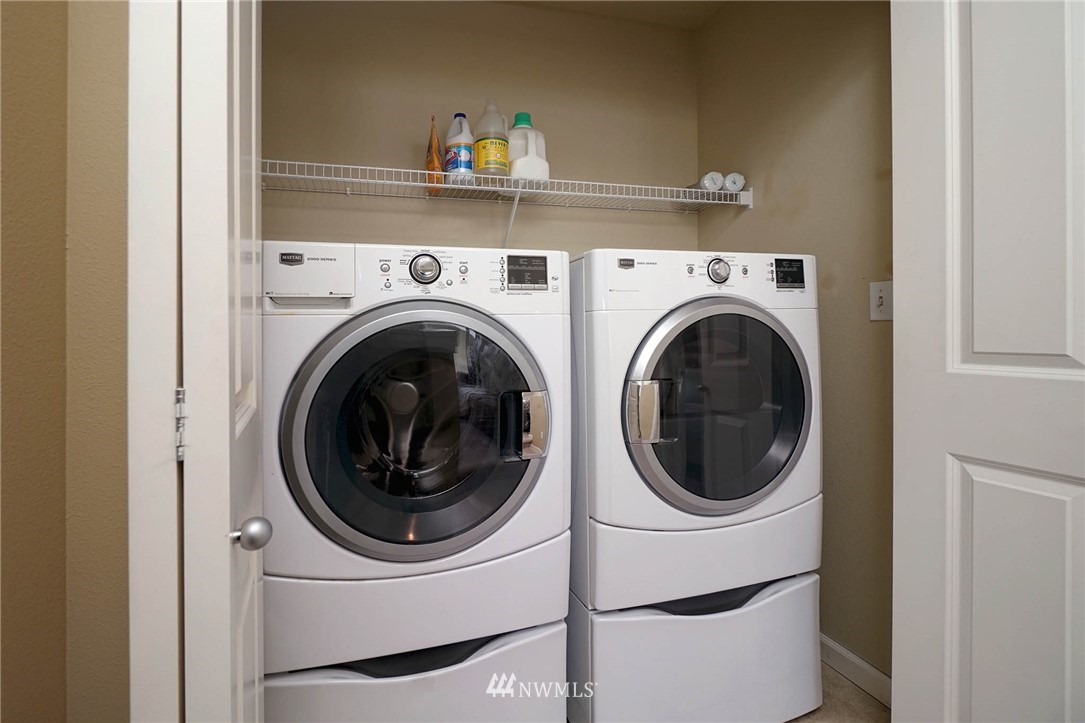 23927 33rd Drive Southeast, Unit 15 Bothell, WA 98021 - Photo 24 of 34 a utility room with dryer and washer