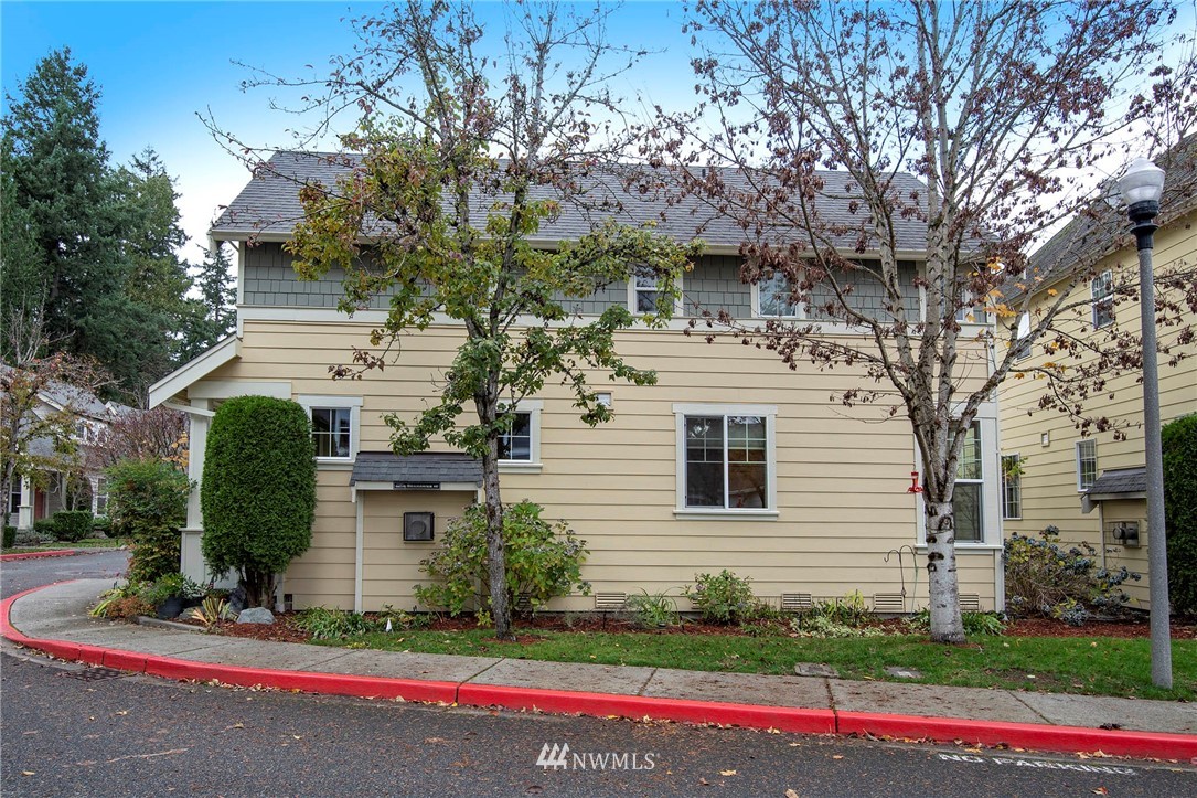 23927 33rd Drive Southeast, Unit 15 Bothell, WA 98021 - Photo 27 of 34 a front view of a house with a yard