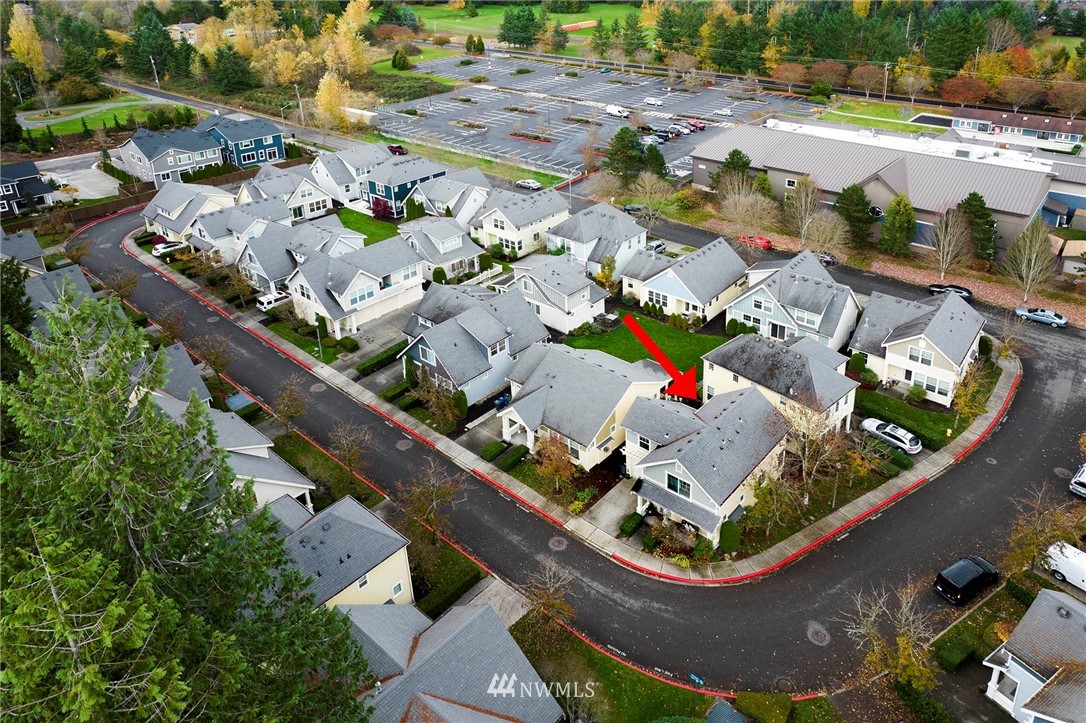 23927 33rd Drive Southeast, Unit 15 Bothell, WA 98021 - Photo 28 of 34 an aerial view of a house with a swimming pool
