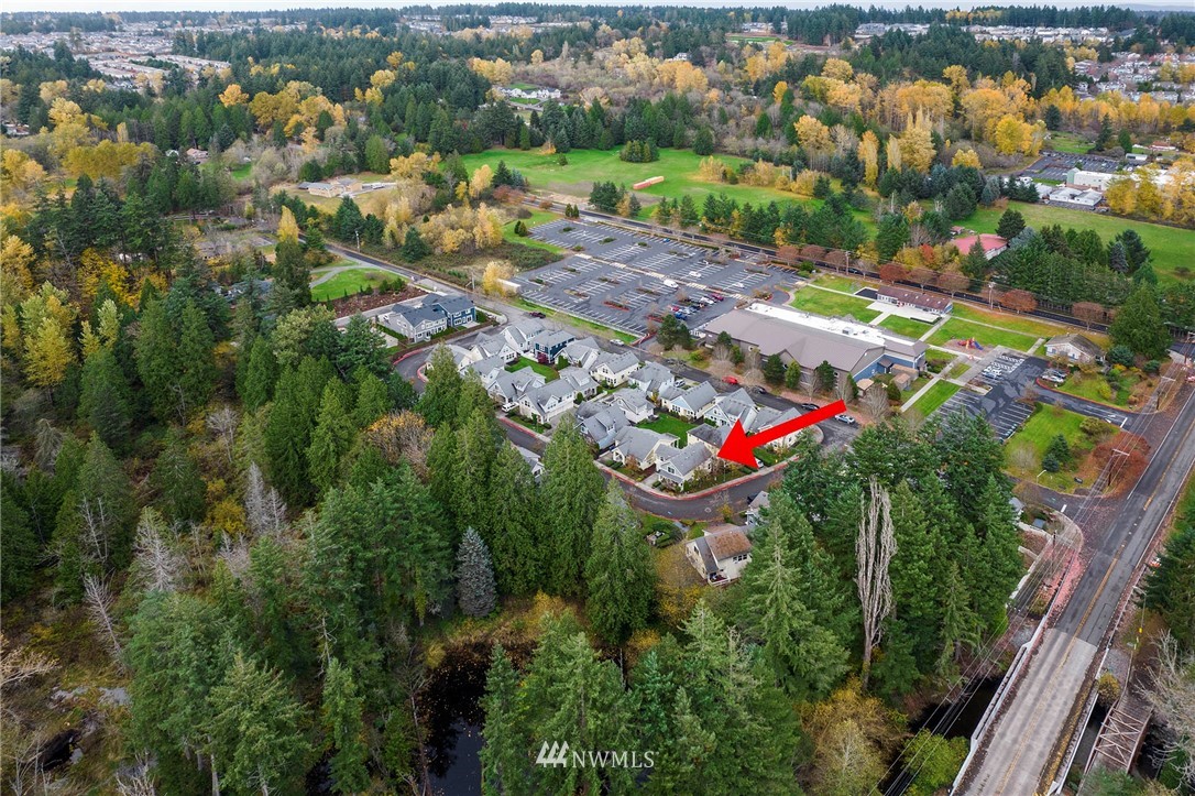 23927 33rd Drive Southeast, Unit 15 Bothell, WA 98021 - Photo 29 of 34 an aerial view of residential houses with outdoor space and street view