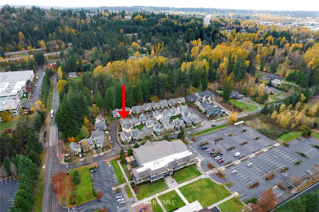 23927 33rd Drive Southeast, Unit 15 Bothell, WA 98021 - Photo 31 of 34 an aerial view of a house with a garden and lake view