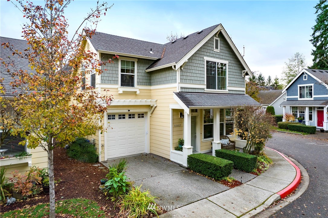 23927 33rd Drive Southeast, Unit 15 Bothell, WA 98021 - Photo 33 of 34 a front view of a house with garden