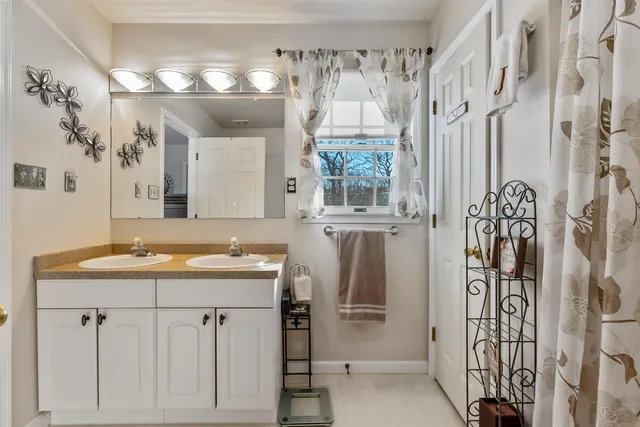 a bedroom with a workspace