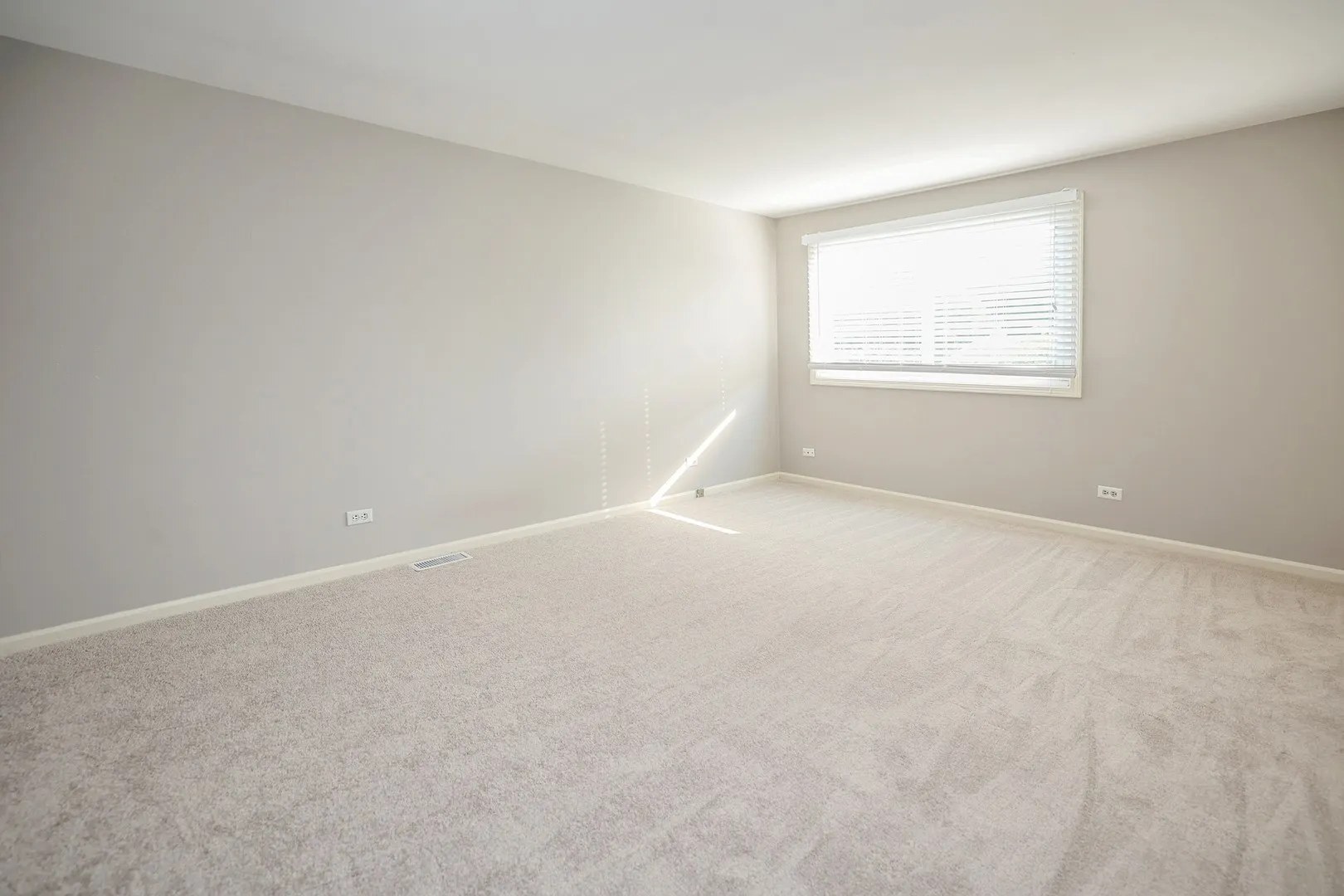 1329 Stonegate Road Naperville, IL 60540 - Photo 5 of 19 an empty room with windows
