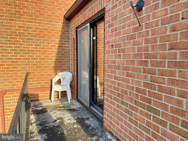 a view of a balcony with an outdoor space