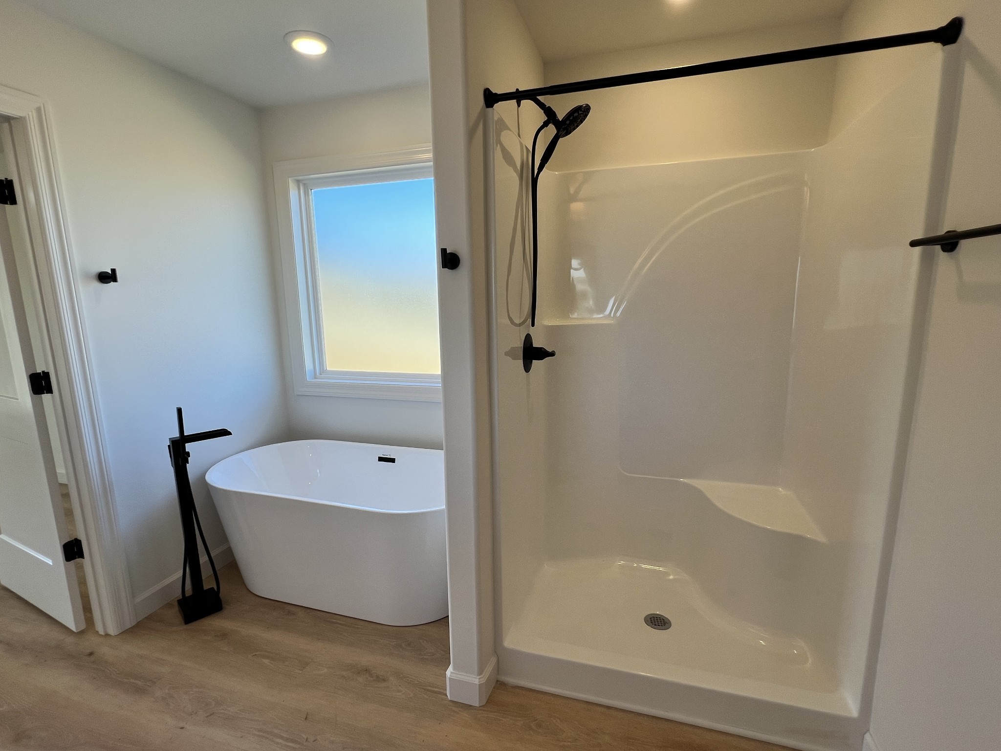 9728 Campbellsville Road Pulaski, TN 38478 - Photo 11 of 21 a bathroom with a tub and a shower