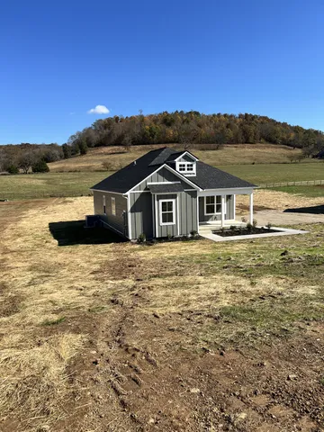 a front view of a house with a ocean view
