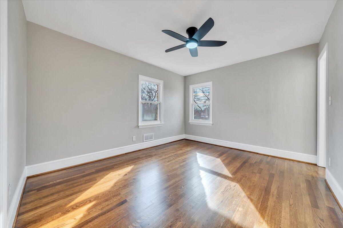 3452 Courtland Road Northwest Roanoke, VA 24012 - Photo 19 of 54 a view of a big room with wooden floor and windows