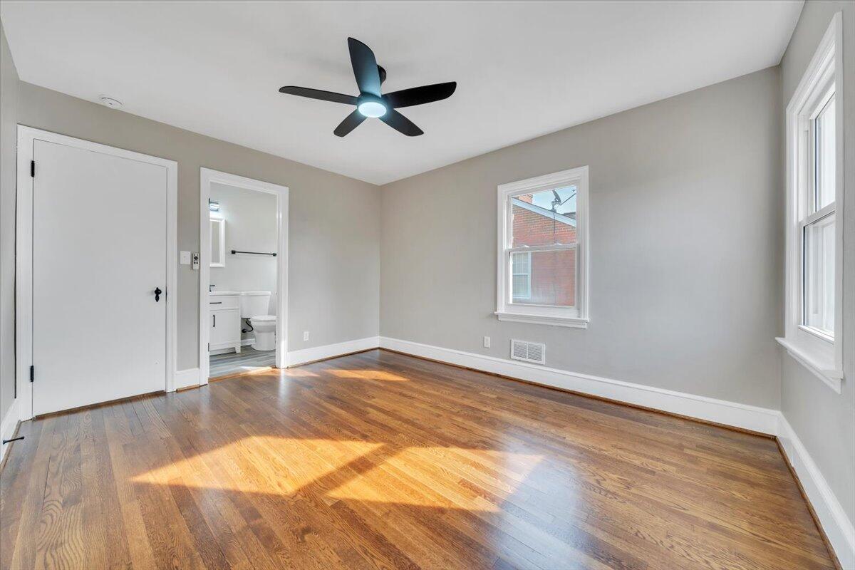 3452 Courtland Road Northwest Roanoke, VA 24012 - Photo 21 of 54 a view of empty room with wooden floor and window