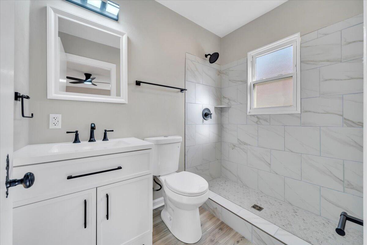 3452 Courtland Road Northwest Roanoke, VA 24012 - Photo 23 of 54 a bathroom with a sink toilet and shower