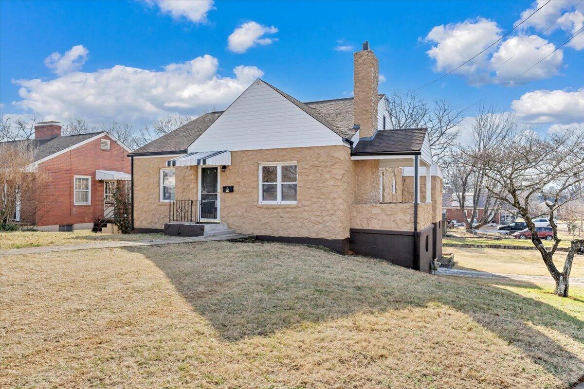 3452 Courtland Road Northwest Roanoke, VA 24012 - Photo 50 of 54 a view of a house with a snow in the yard