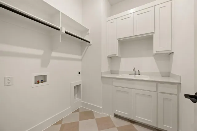 a bathroom with a sink and mirror