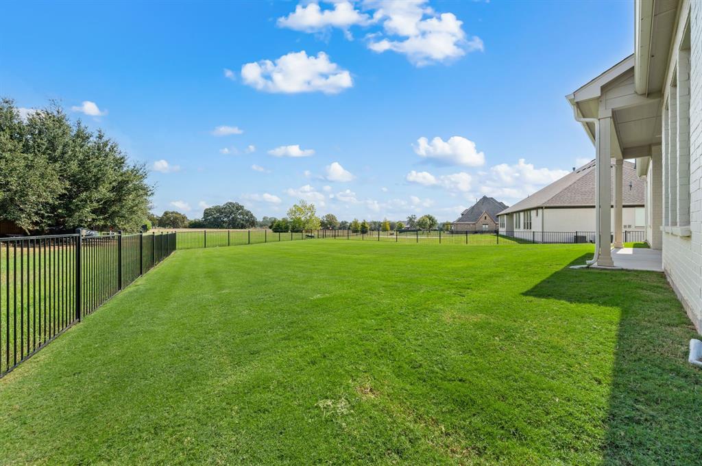 128 Highgate Court Boyd, TX 76023 - Photo 35 of 40 a view of a golf course with a big yard