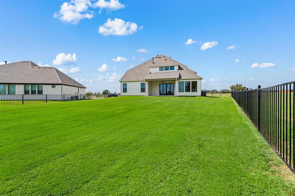 128 Highgate Court Boyd, TX 76023 - Photo 39 of 40 a view of a house with a yard
