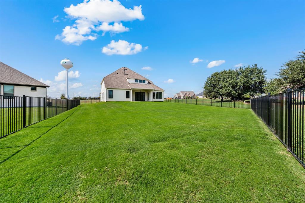 128 Highgate Court Boyd, TX 76023 - Photo 40 of 40 a view of a house with a yard