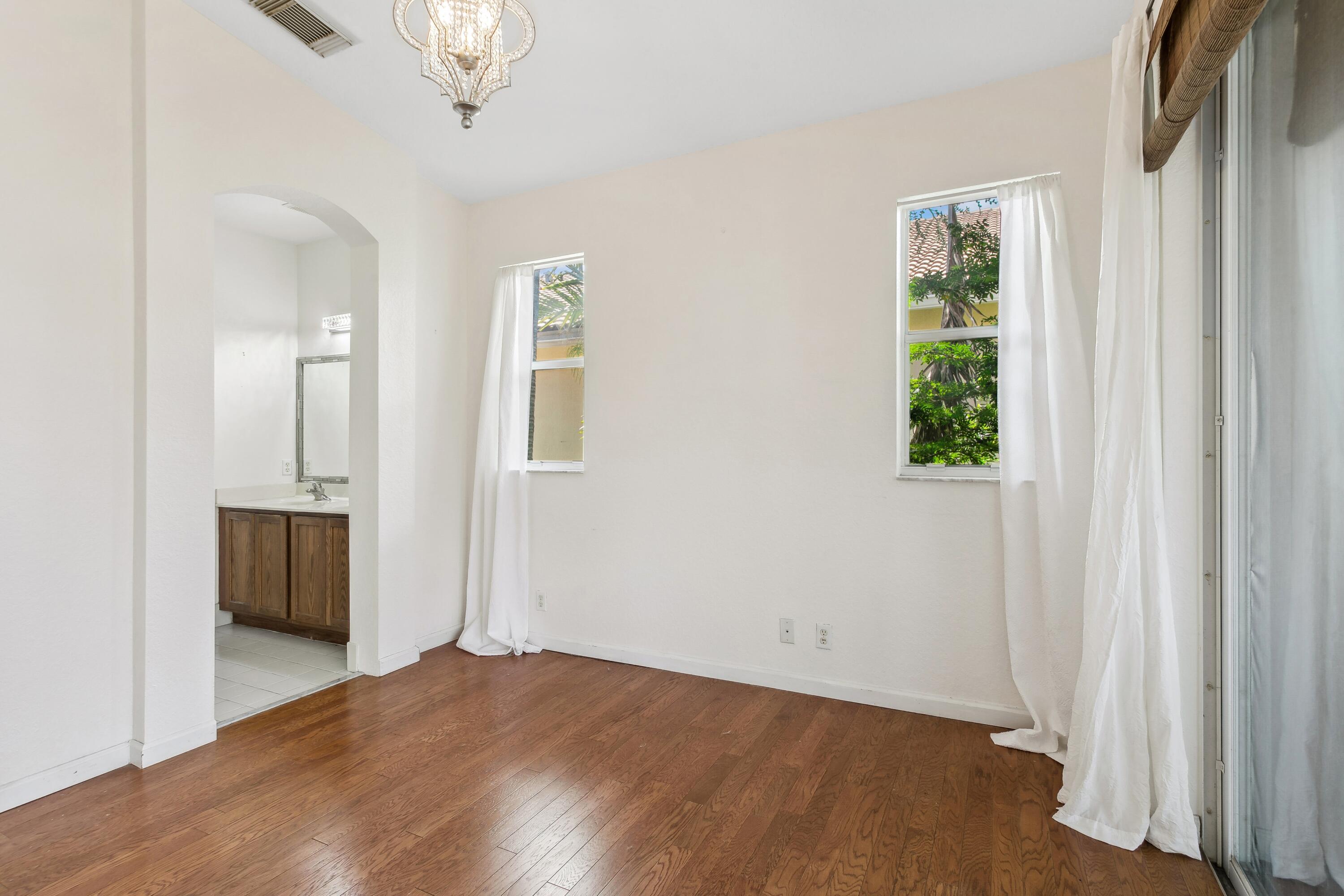 3248 Mirella Drive Riviera Beach, FL 33404 - Photo 12 of 25 Master Bedroom Suite