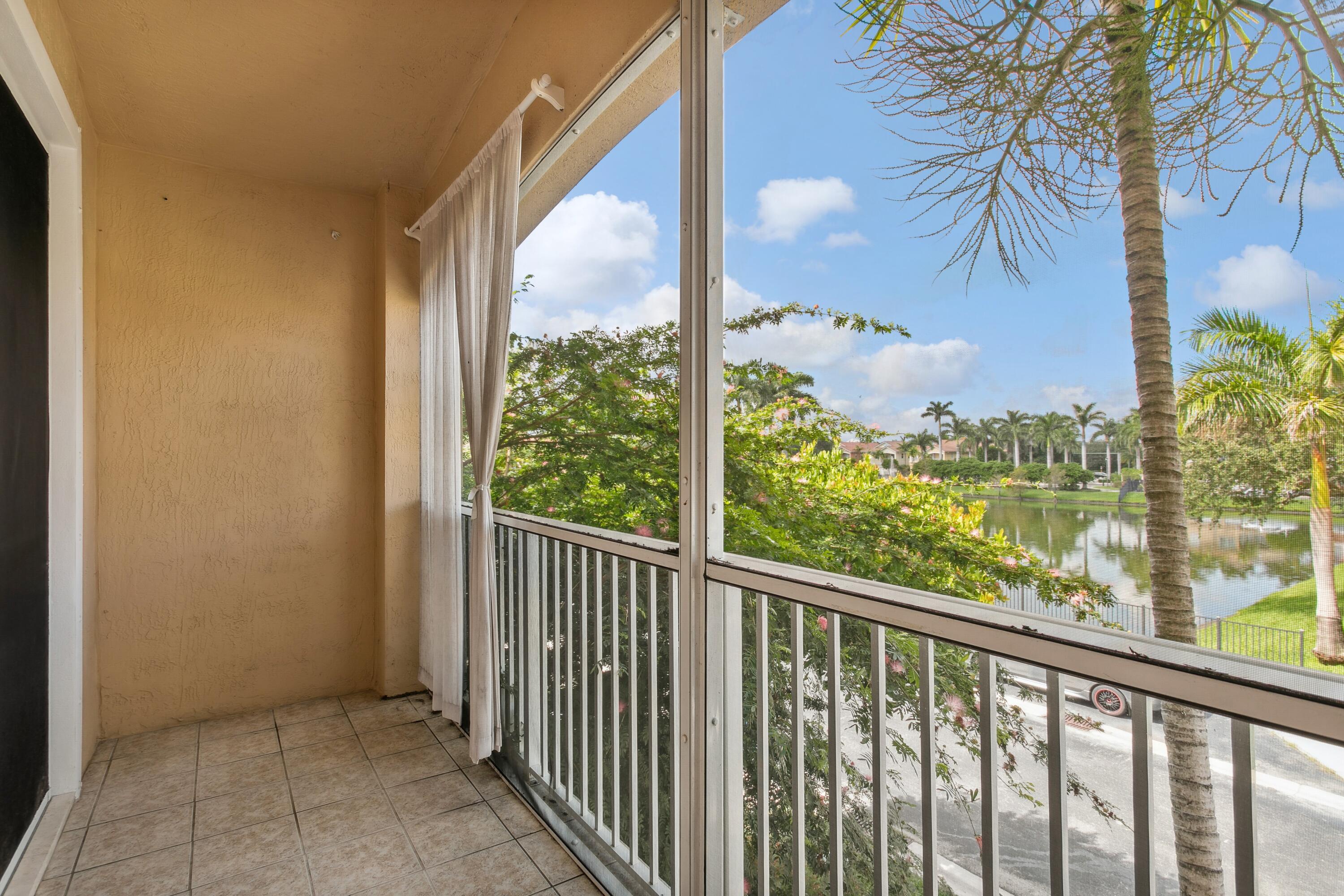3248 Mirella Drive Riviera Beach, FL 33404 - Photo 18 of 25 Screened in Porch