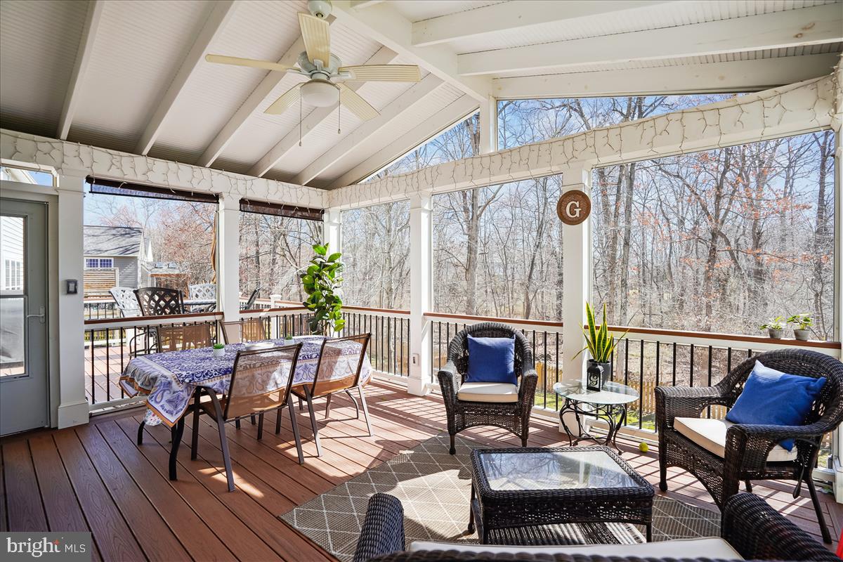 42925 Ellzey Drive Broadlands, VA 20148 - Photo 11 of 96 a view of a dining room with furniture window and outside view