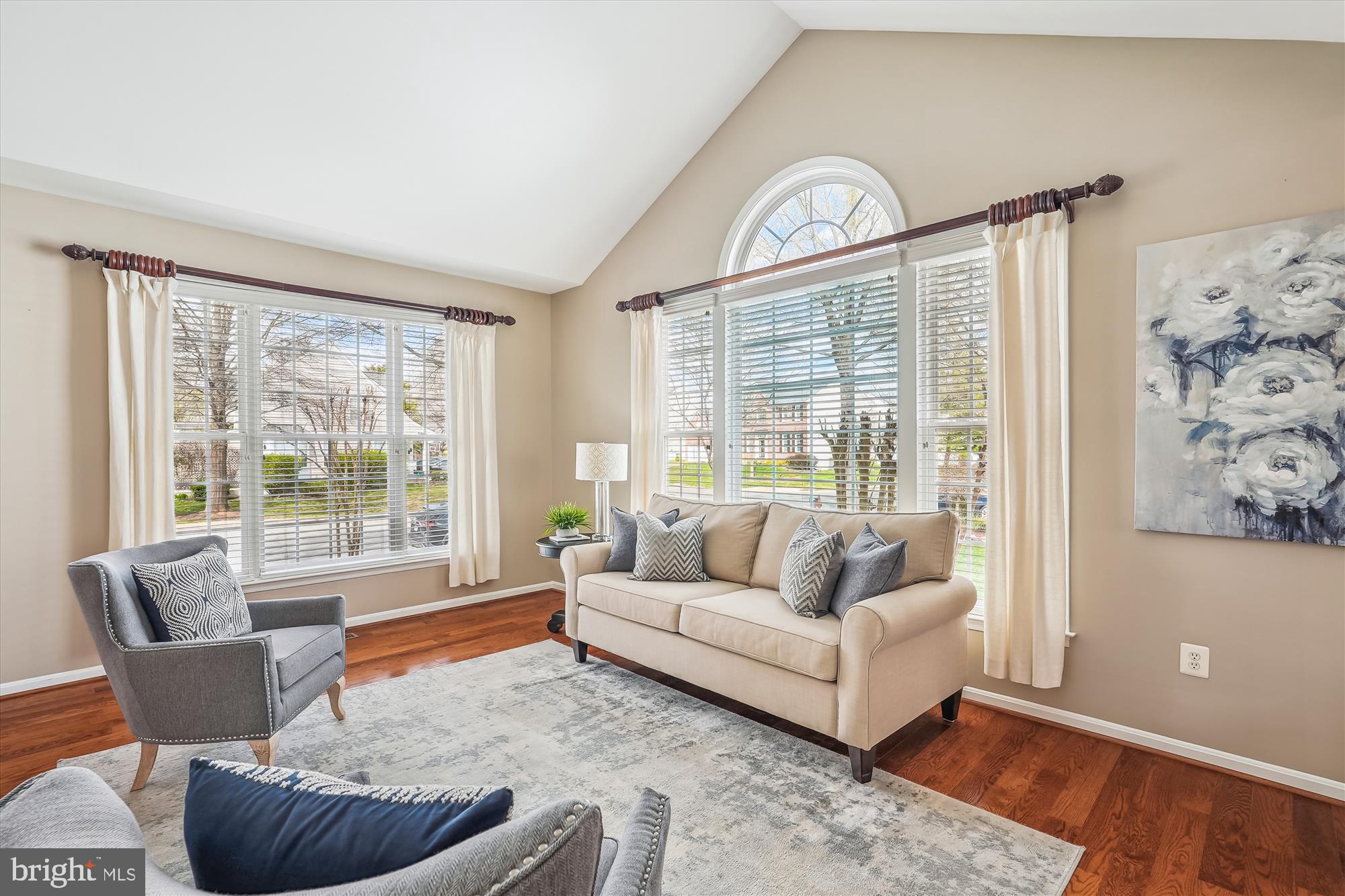 42925 Ellzey Drive Broadlands, VA 20148 - Photo 19 of 96 a living room with furniture and a large window